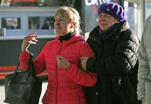 Relatives of the victims of a Russian airliner with 217 passengers and seven crew aboard has crashed, react as they gather at Pulkovo airport in St.Petersburg, Russia, Saturday, Oct. 31, 2015. Russia's civil air agency is expected to have a news conference shortly to talk about the Russian Metrojet passenger plane that Egyptian authorities say has crashed in Egypt's Sinai peninsula. (AP Photo/Dmitry Lovetsky)