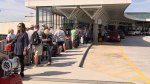 Travelers stand in line outside of Nashville International Airport on Saturday, Oct. 11. (Photo: WKRN)